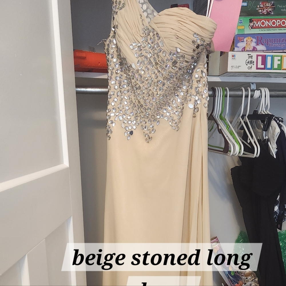 Flesh colored formal dress.